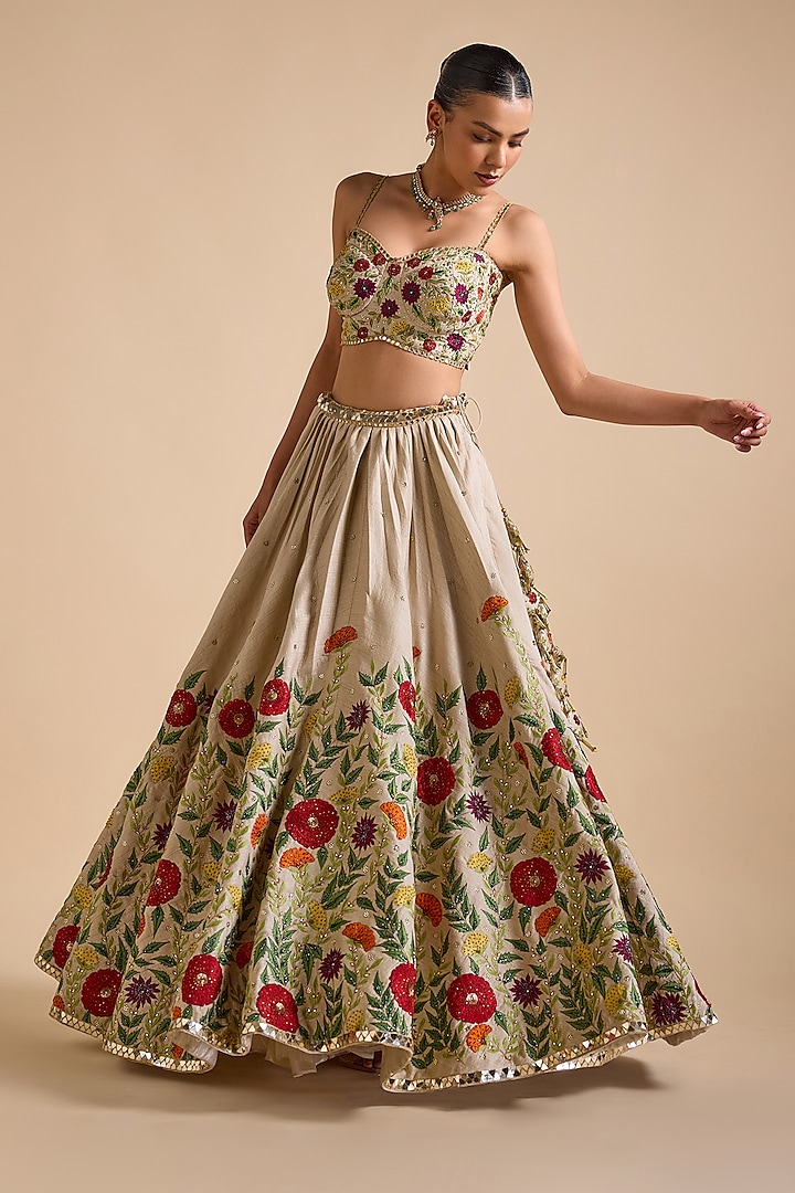 Ivory Silk Thread & Sequins Embroidered Bridal Lehenga Set by Prevasu at Pernia's Pop Up Shop