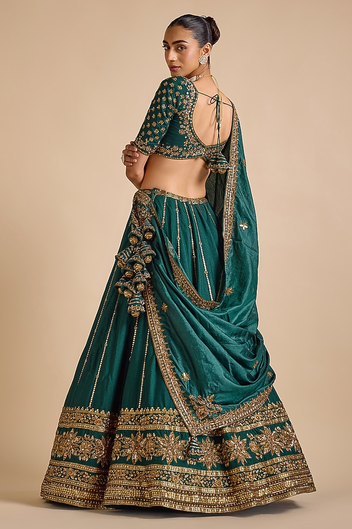 Bottle Green Blended Tussar Bridal Lehenga Set by Prevasu at Pernia's Pop Up Shop