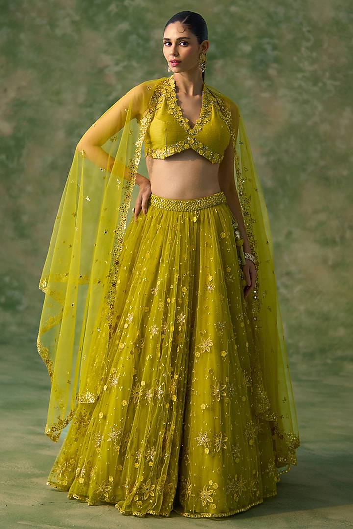 Yellow Net Floral Embroidered Bridal Lehenga Set by Prevasu at Pernia's Pop Up Shop