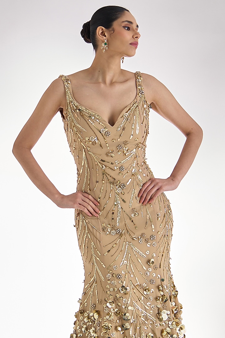 Golden Georgette Sequins Embroidered Flared Wedding Gown by Prevasu at Pernia's Pop Up Shop