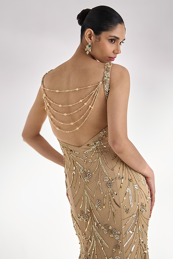 Golden Georgette Sequins Embroidered Flared Wedding Gown by Prevasu at Pernia's Pop Up Shop