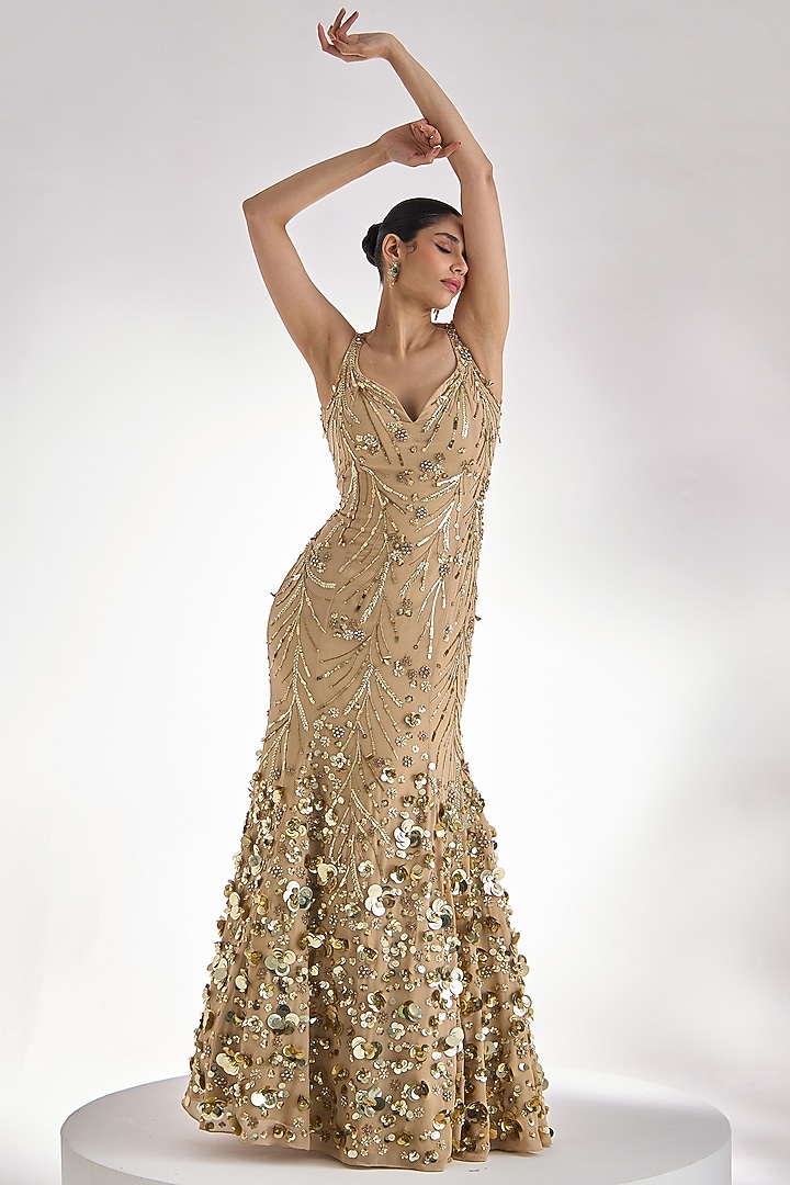 Golden Georgette Sequins Embroidered Flared Wedding Gown by Prevasu at Pernia's Pop Up Shop