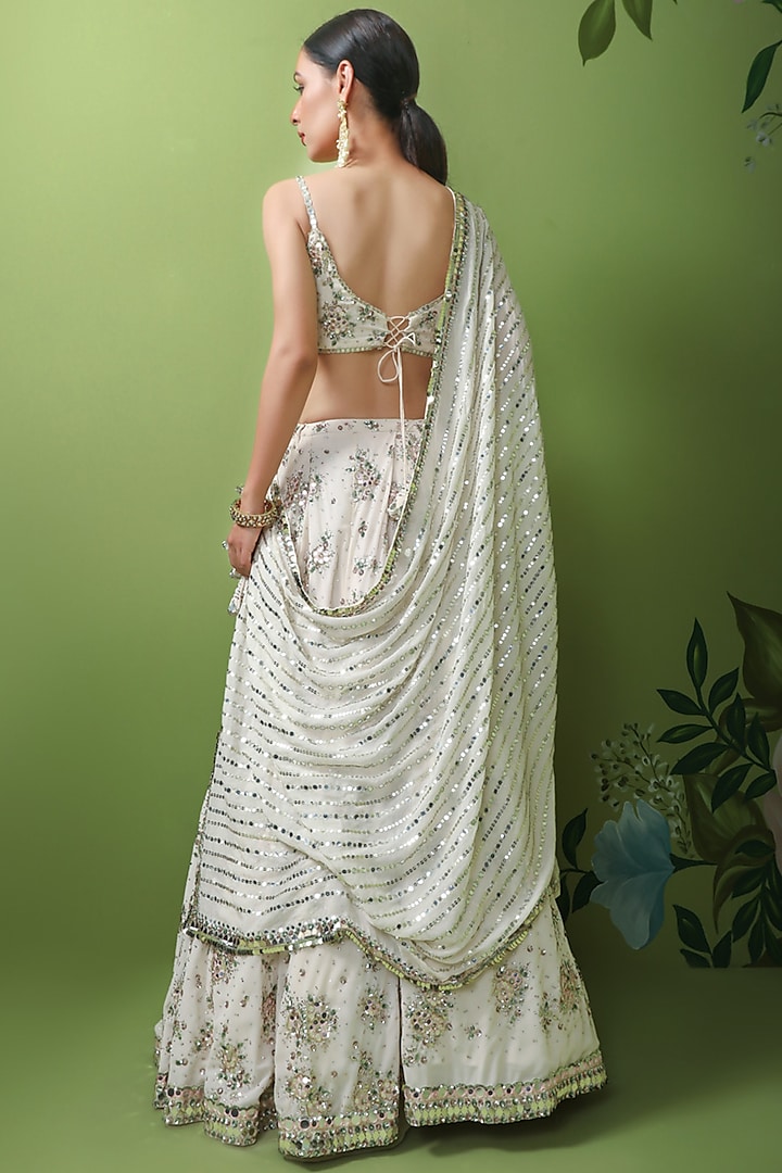 Off-White Embroidered Bridal Lehenga Set by Prevasu at Pernia's Pop Up Shop