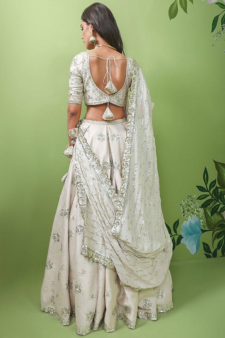 Ivory Crepe Silk Embroidered Wedding Lehenga Set by Prevasu at Pernia's Pop Up Shop