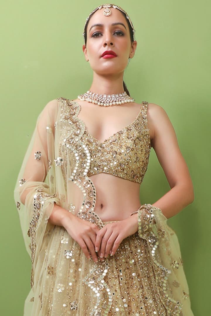 Gold Tulle Embroidered Bridal Lehenga Set by Prevasu at Pernia's Pop Up Shop