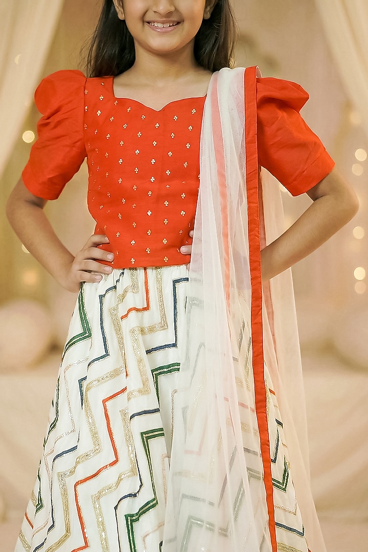Off-White Raw Silk Embroidered Lehenga Set For Girls by Pragya exclusive at Pernia's Pop Up Shop