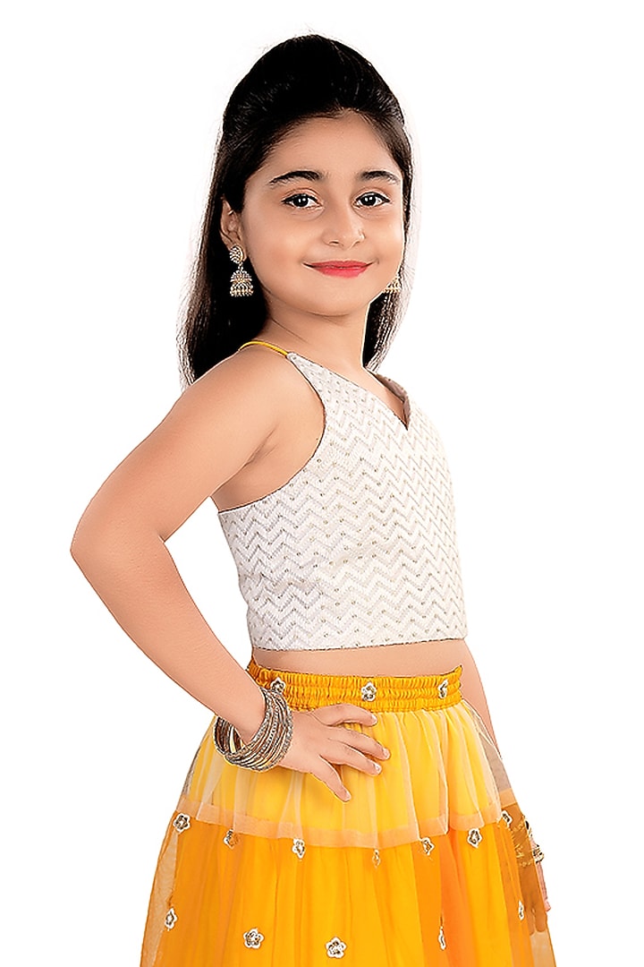 Yellow Net Sequins Embroidered Tiered Lehenga Set For Girls by Pragya exclusive at Pernia's Pop Up Shop