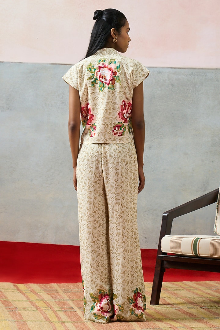 Beige Double Georgette Motif Embroidered Crop Top by POOJA RAJGARHIA GUPTA at Pernia's Pop Up Shop