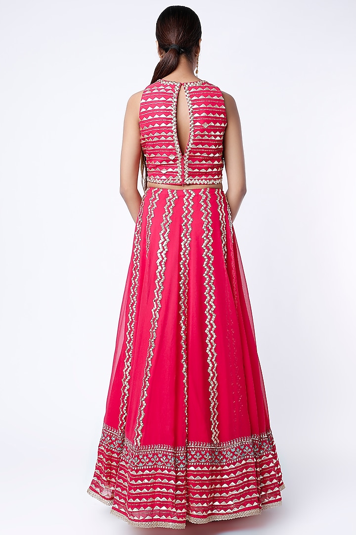 Fuchsia Sequins Embroidered Lehenga Set by POOJA RAJGARHIA GUPTA