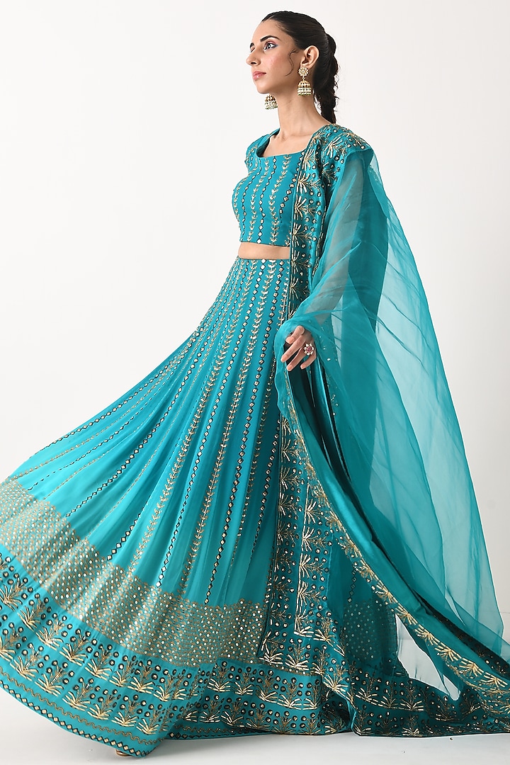 Teal Ombre Sequins Embroidered Lehenga Set by POOJA RAJGARHIA GUPTA