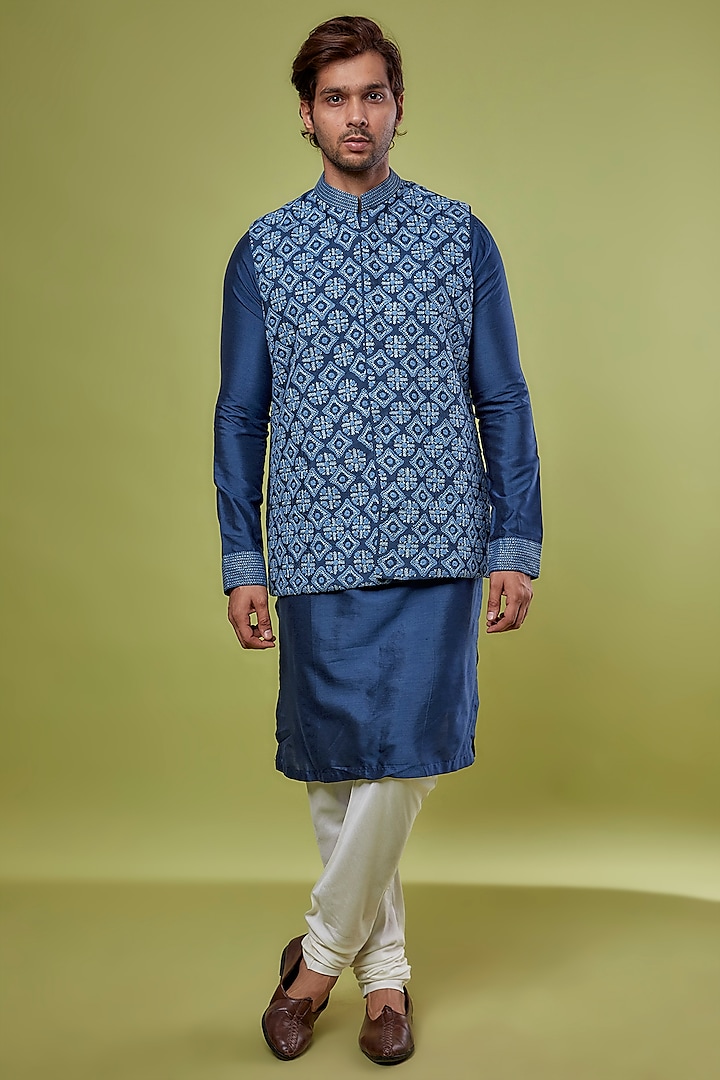 Blue Banarasi Cotton Silk Embroidered Bundi Jacket With Kurta Set by PRIYANKA HARALALKA