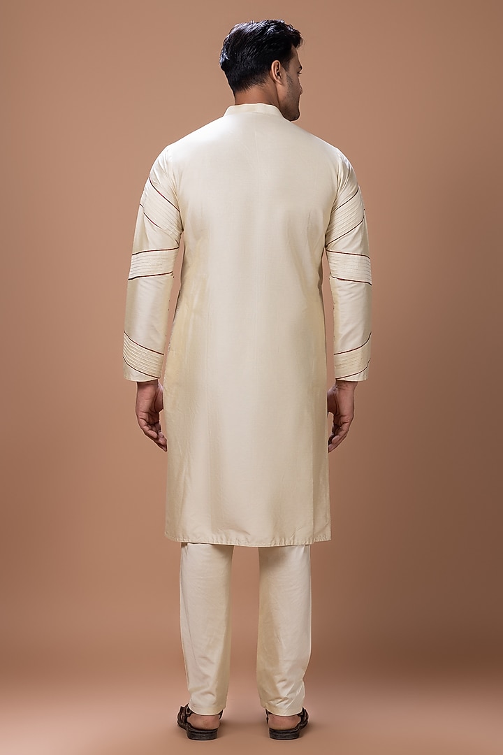 Beige Cotton Silk Machine Embroidered Kurta Set by PRIYANKA HARALALKA at Pernia's Pop Up Shop