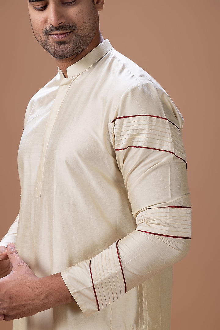 Beige Cotton Silk Machine Embroidered Kurta Set by PRIYANKA HARALALKA at Pernia's Pop Up Shop