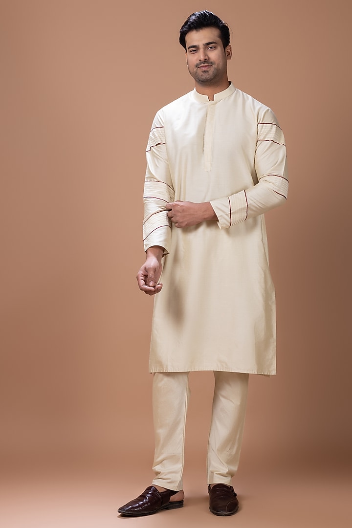 Beige Cotton Silk Machine Embroidered Kurta Set by PRIYANKA HARALALKA at Pernia's Pop Up Shop