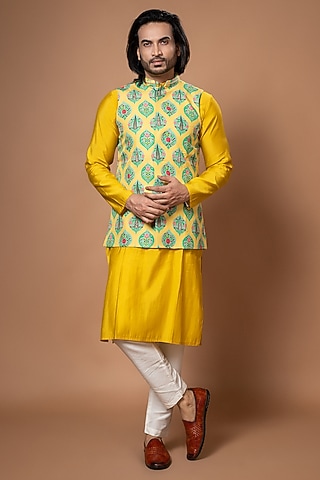 Mustard Yellow Roman Silk Printed & Hand Embroidered Bundi Jacket Set by PRIYANKA HARALALKA