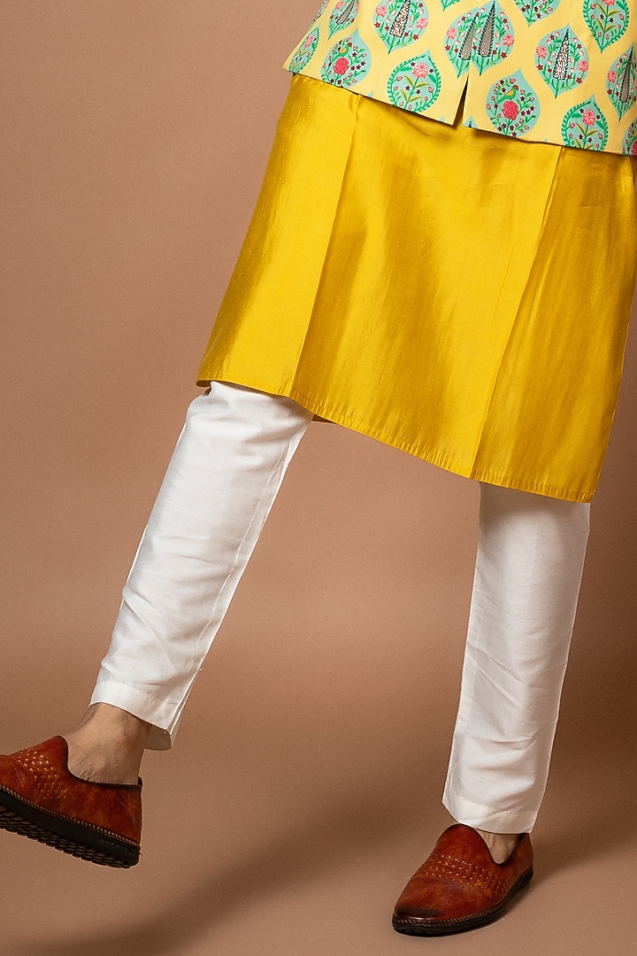 Mustard Yellow Roman Silk Printed & Hand Embroidered Bundi Jacket Set by PRIYANKA HARALALKA at Pernia's Pop Up Shop