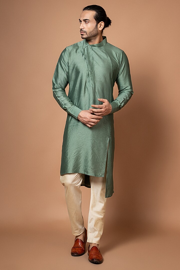 Olive Green Silk & Cotton Silk Machine Embroidered Bundi Jacket Set by PRIYANKA HARALALKA at Pernia's Pop Up Shop