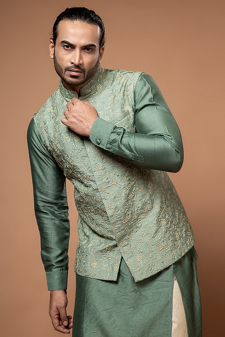 Olive Green Silk & Cotton Silk Machine Embroidered Bundi Jacket Set by PRIYANKA HARALALKA at Pernia's Pop Up Shop