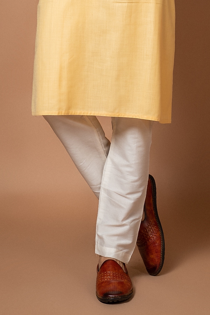 Lemon Yellow Ruby Silk & Cotton Silk Thread Machine Embroidered Bundi Jacket Set by PRIYANKA HARALALKA at Pernia's Pop Up Shop