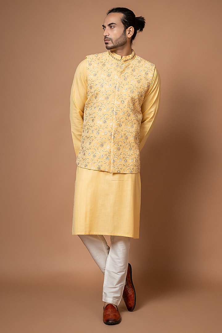 Lemon Yellow Ruby Silk & Cotton Silk Thread Machine Embroidered Bundi Jacket by PRIYANKA HARALALKA at Pernia's Pop Up Shop