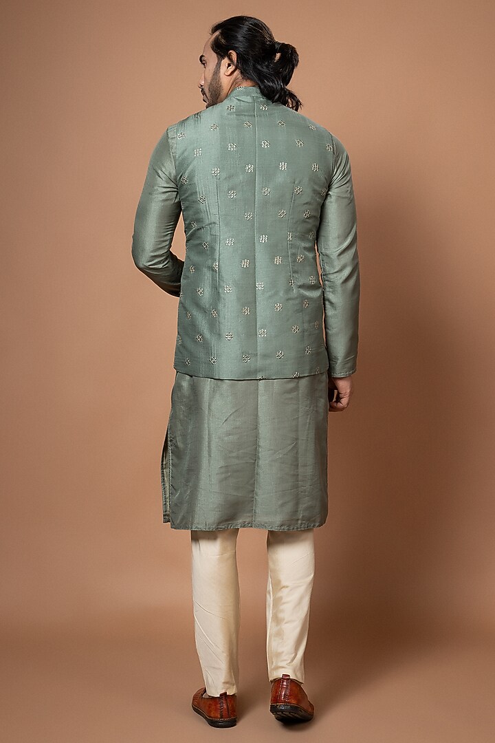 Olive Green Silk & Cotton Silk Machine Embroidered Bundi Jacket by PRIYANKA HARALALKA at Pernia's Pop Up Shop
