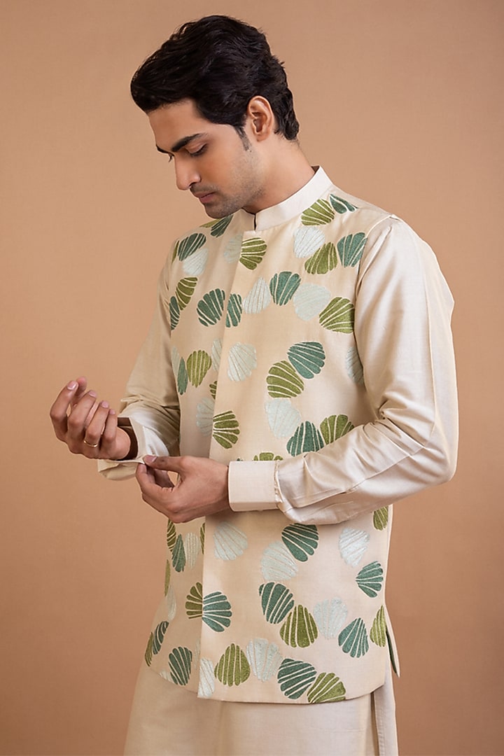 Beige Cotton Silk Machine Embroidered Bundi Jacket by PRIYANKA HARALALKA at Pernia's Pop Up Shop