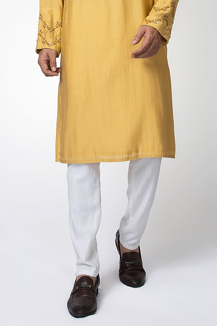 Mustard Cotton Silk Zardosi Hand Embroidered Kurta Set by PRIYANKA HARALALKA at Pernia's Pop Up Shop