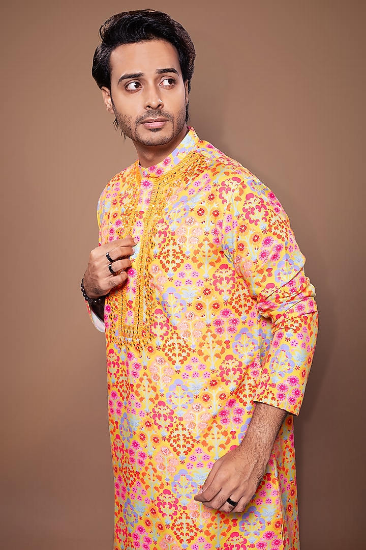 Mustard Cotton Silk Floral Printed & Hand Embroidered Kurta Set by PRIYANKA HARALALKA at Pernia's Pop Up Shop