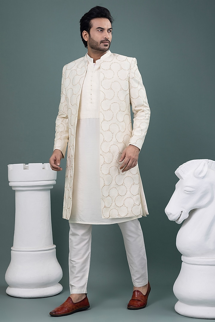 Ivory Raw Silk & Cotton Silk Hand Embroidered Wedding Sherwani Set by PRIYANKA HARALALKA at Pernia's Pop Up Shop