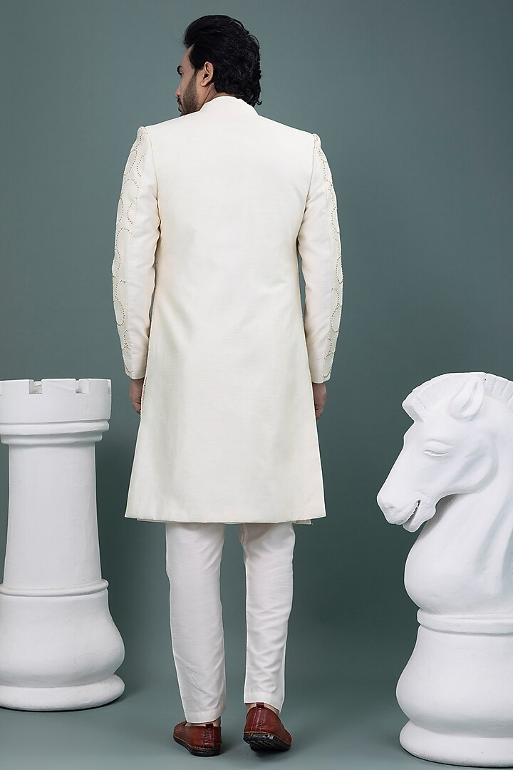 Ivory Raw Silk & Cotton Silk Hand Embroidered Wedding Sherwani Set by PRIYANKA HARALALKA at Pernia's Pop Up Shop