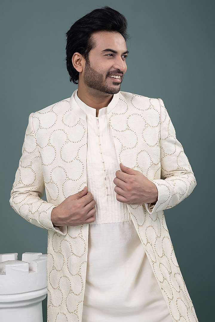 Ivory Raw Silk & Cotton Silk Hand Embroidered Wedding Sherwani Set by PRIYANKA HARALALKA at Pernia's Pop Up Shop