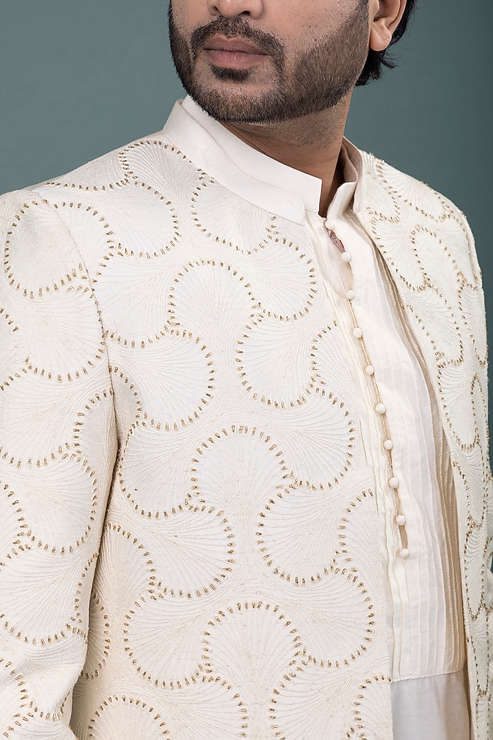 Ivory Raw Silk & Cotton Silk Hand Embroidered Wedding Sherwani Set by PRIYANKA HARALALKA at Pernia's Pop Up Shop