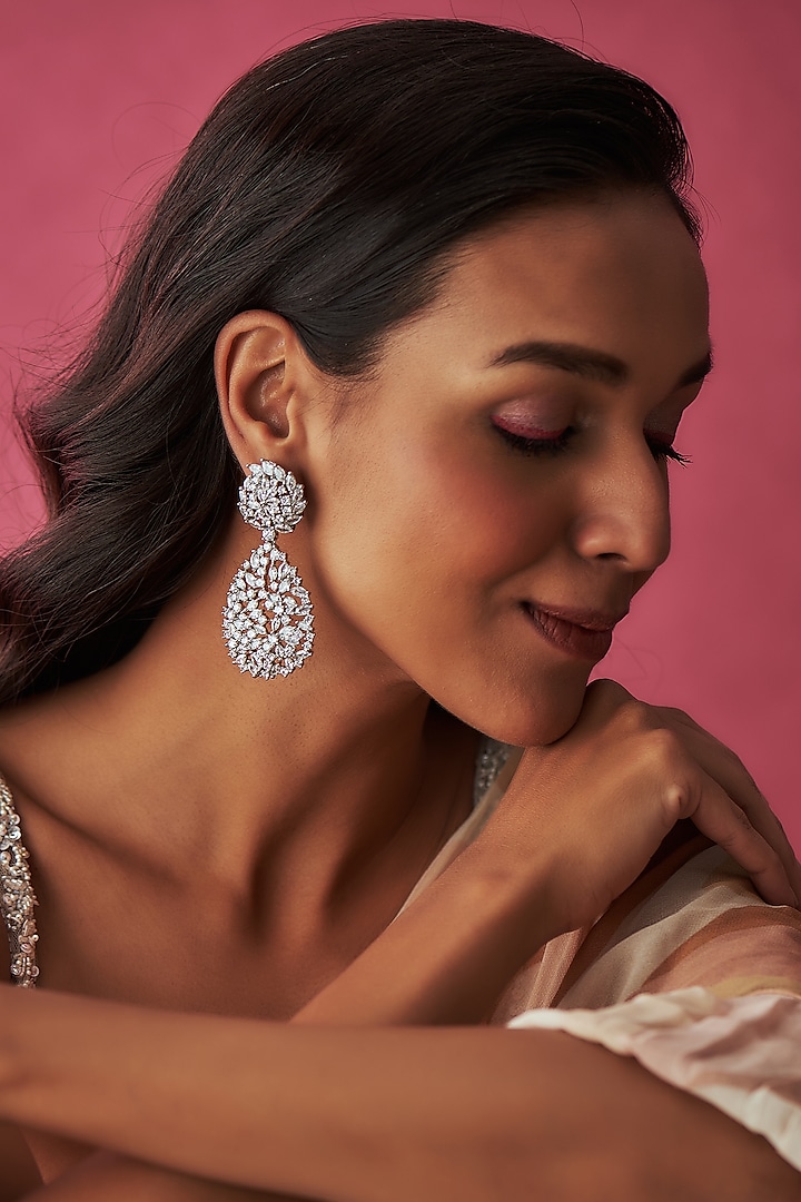 White Finish Faux Diamond Dangler Earrings by Prihan Luxury Jewelry at Pernia's Pop Up Shop