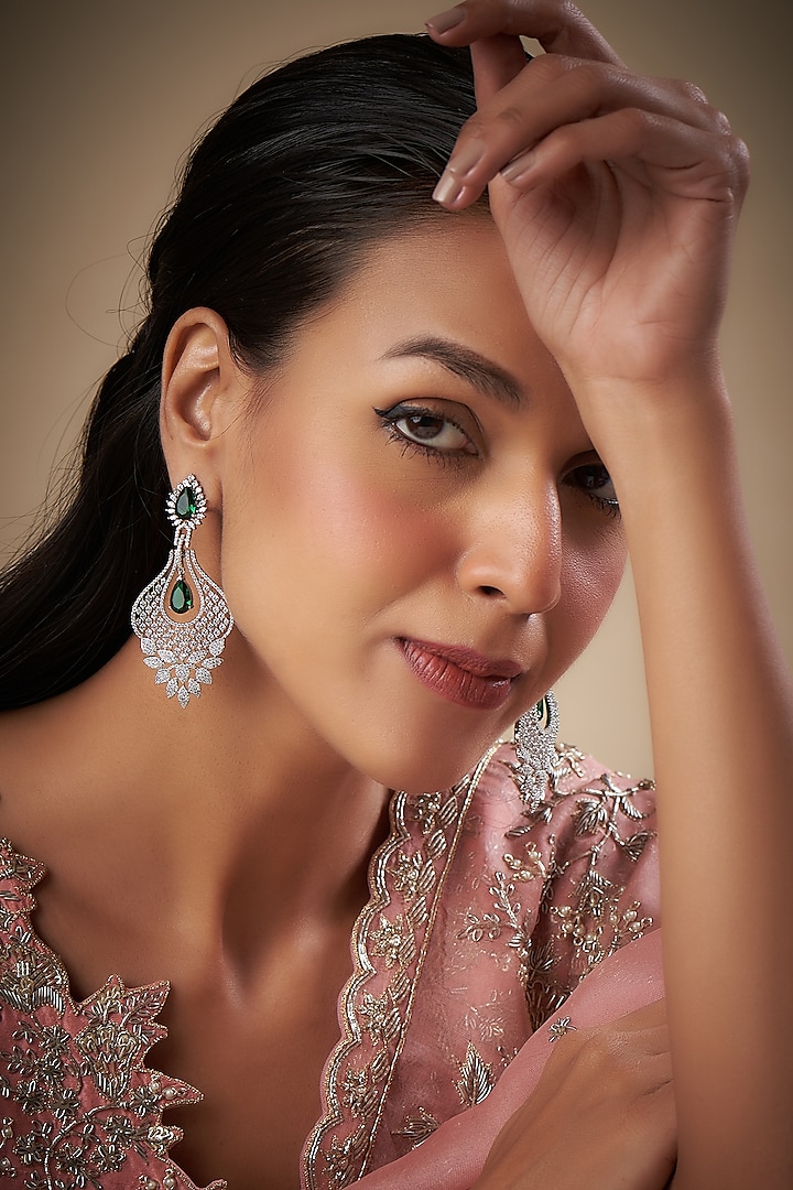 White Finish Zircon & Synthetic Emerald Dangler Earrings by Prihan Luxury Jewelry at Pernia's Pop Up Shop