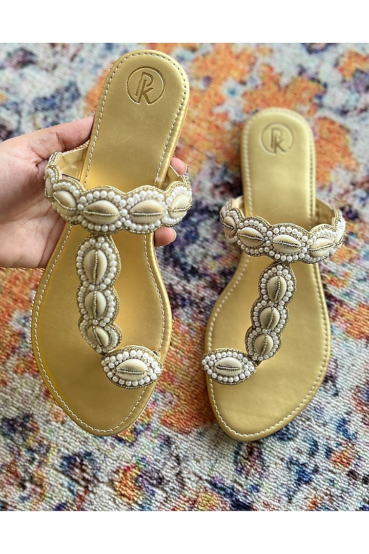 Gold Faux Leather Cowrie Hand Embroidered Kolhapuri Flats by Preet Kaur at Pernia's Pop Up Shop