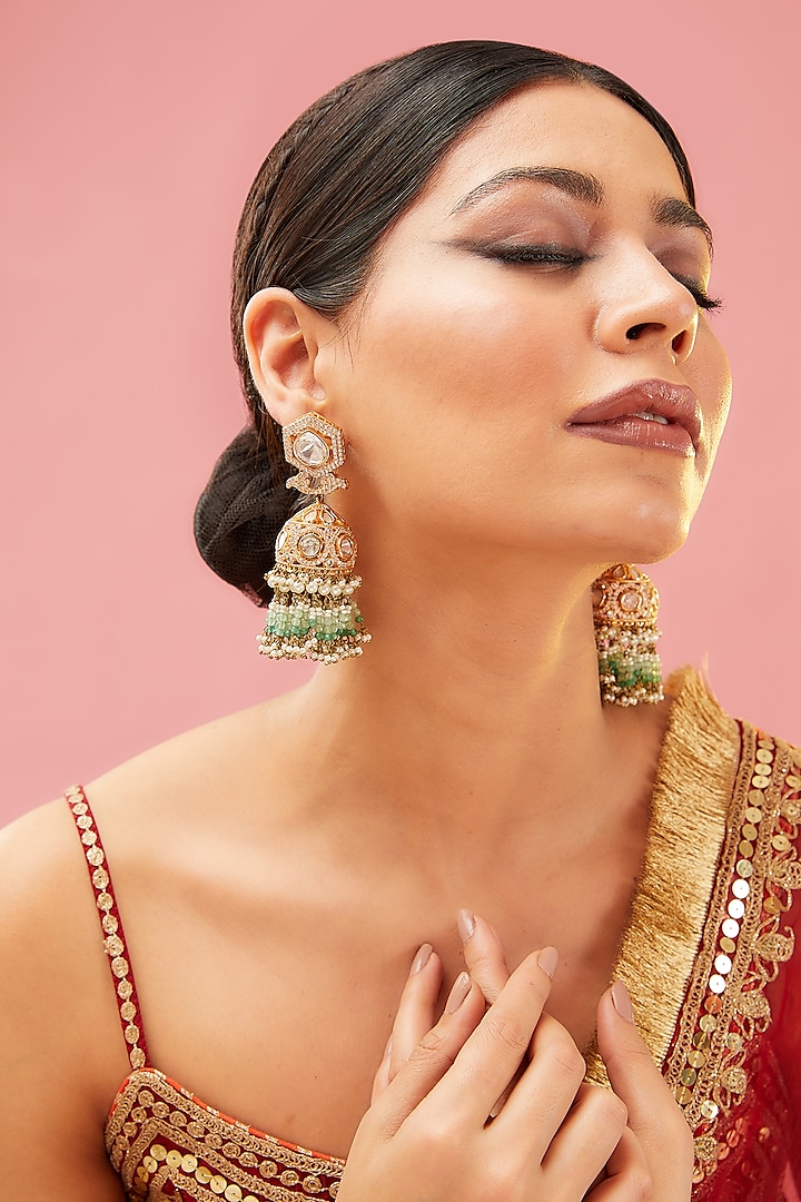 Gold Finish Green Kundan Polki & Zircon Jhumka Earrings by Preeti Mohan
