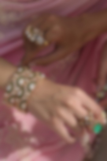 Gold Finish Green Kundan Polki Bangles (Set Of 2) by Preeti Mohan at Pernia's Pop Up Shop