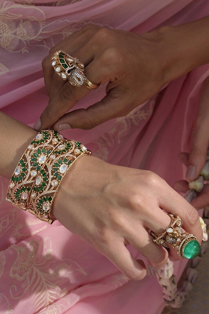 Gold Finish Green Kundan Polki Bangles (Set Of 2) by Preeti Mohan at Pernia's Pop Up Shop