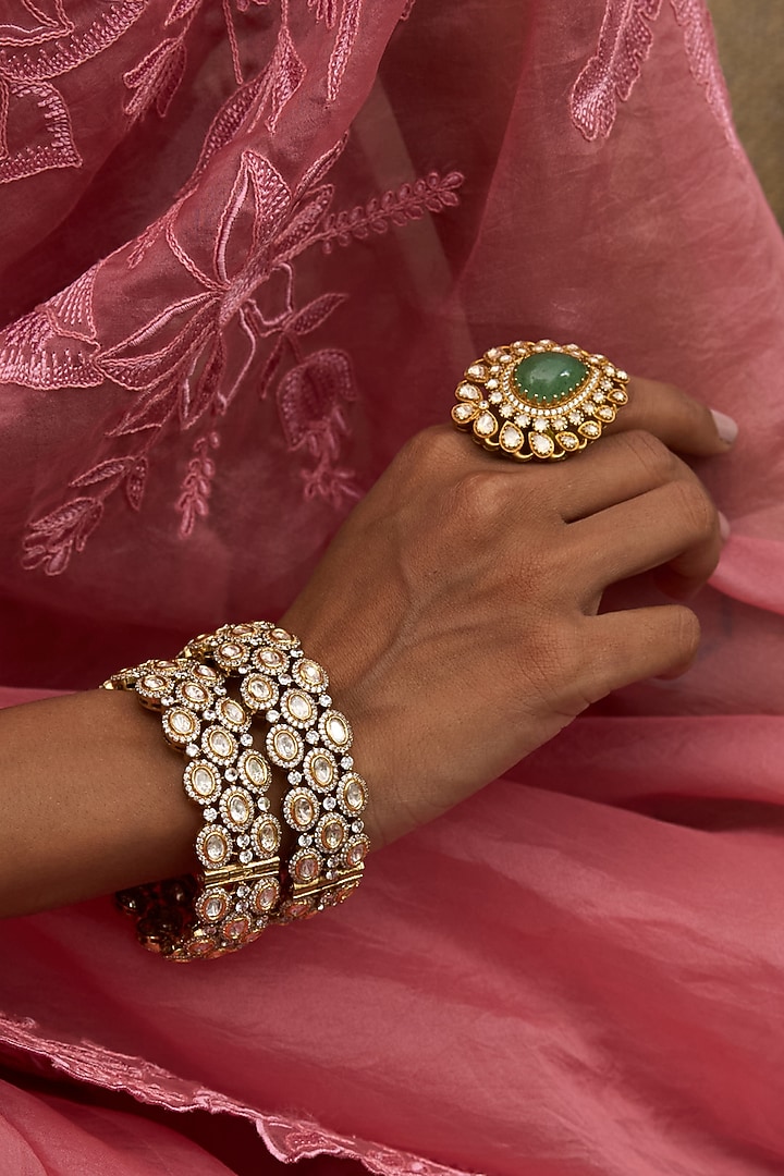 Antique Gold Finish Kundan Polki Bangles (Set Of 2) by Preeti Mohan at Pernia's Pop Up Shop