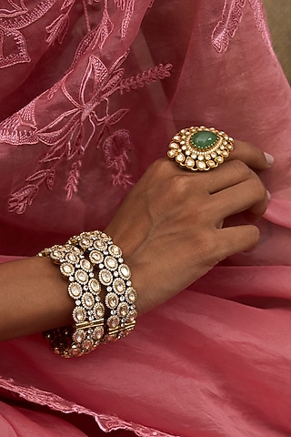 Antique Gold Finish Kundan Polki Bangles (Set Of 2) by Preeti Mohan