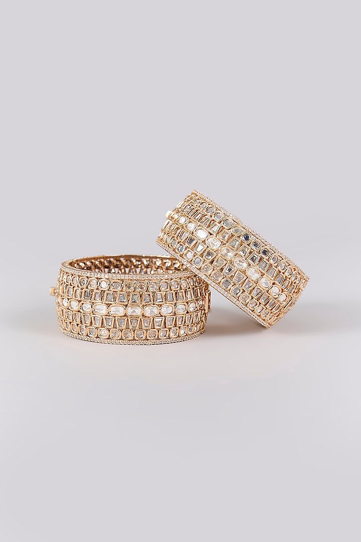 Antique Gold Finish Kundan Polki & Pearl Bangles (Set Of 2) by Preeti Mohan at Pernia's Pop Up Shop