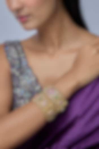 Gold Finish Kundan Polki & Multi-Colored Stone Bangles (Set Of 2) by Preeti Mohan at Pernia's Pop Up Shop