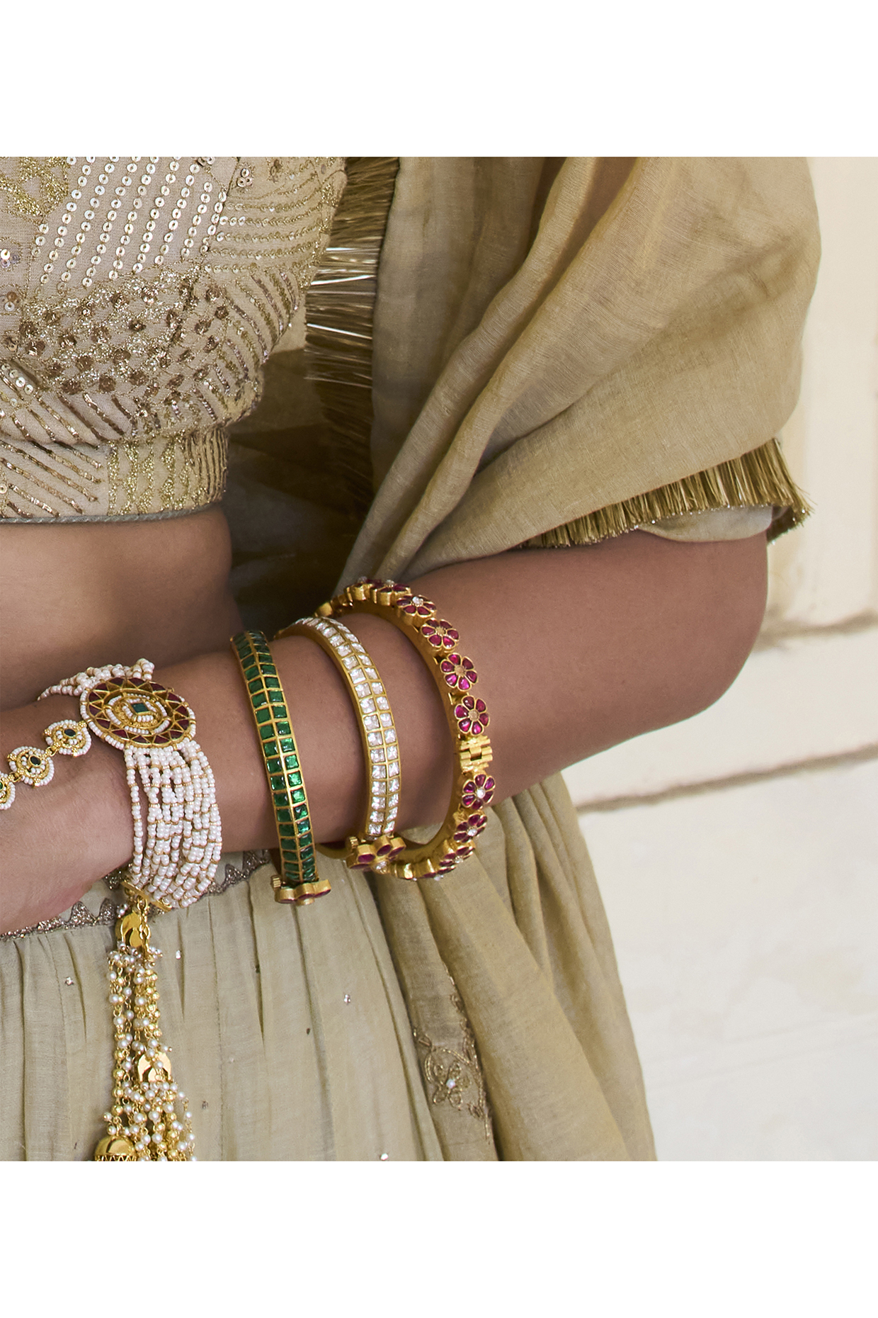 Gold Plated Red & Green Stone Bangles (Set Of 2) by Preeti Mohan at Pernia's Pop Up Shop