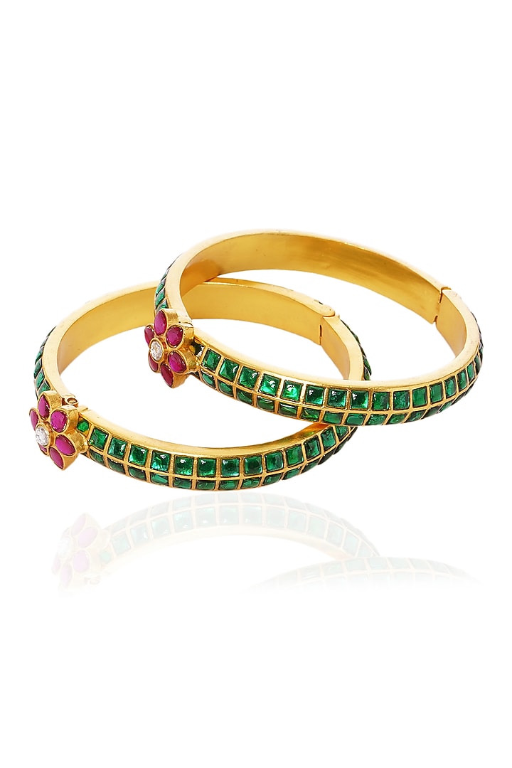 Gold Plated Red & Green Stone Bangles (Set Of 2) by Preeti Mohan at Pernia's Pop Up Shop