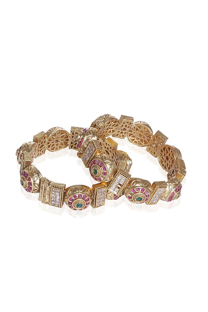 Gold Plated Red & Green Stone Bangles (Set Of 2) by Preeti Mohan at Pernia's Pop Up Shop