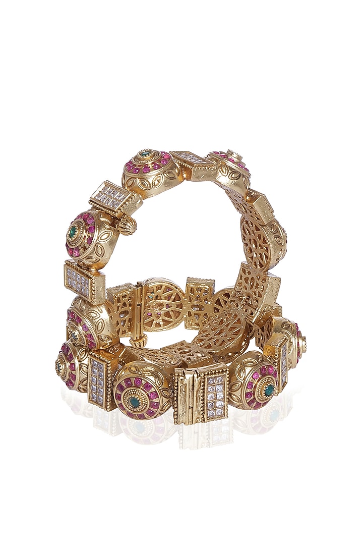 Gold Plated Red & Green Stone Bangles (Set Of 2) by Preeti Mohan at Pernia's Pop Up Shop
