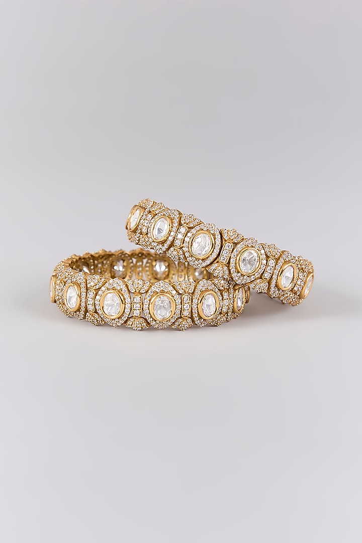 Antique Gold Finish Kundan Polki & Pearl Bangles (Set Of 2) by Preeti Mohan at Pernia's Pop Up Shop