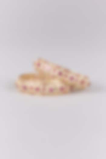 Gold Finish Ruby Bangles (Set Of 2) by Preeti Mohan at Pernia's Pop Up Shop