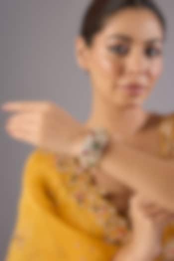 Antique Gold Finish Kundan Polki & Pearl Bangles (Set Of 2) by Preeti Mohan at Pernia's Pop Up Shop