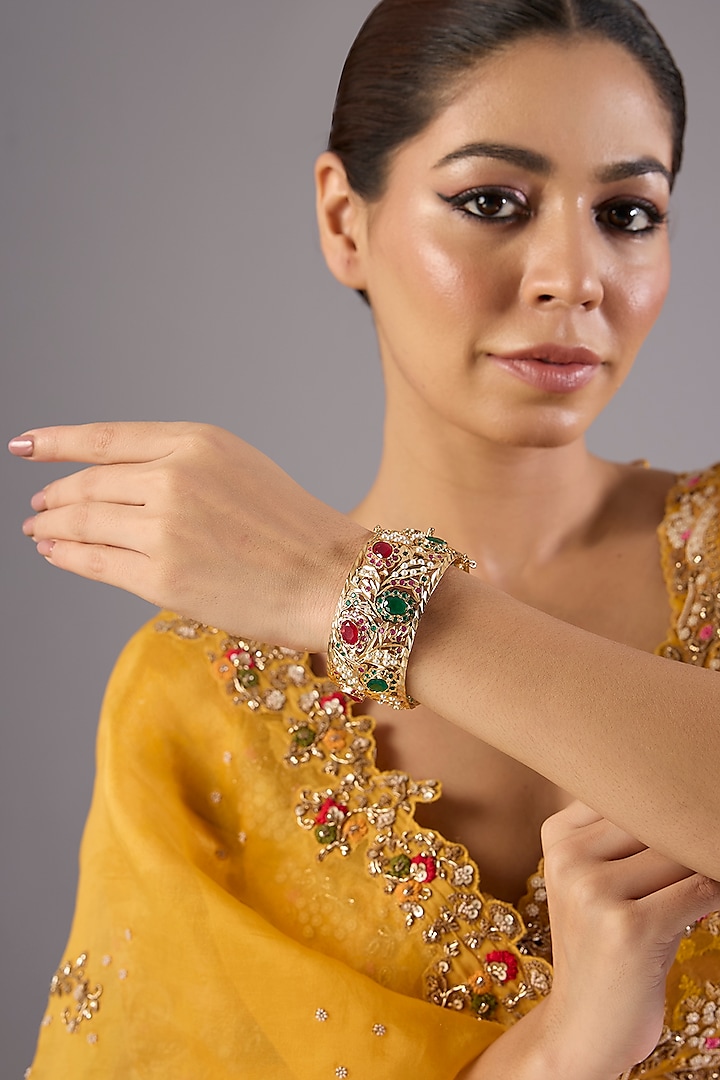 Antique Gold Finish Kundan Polki & Pearl Bangles (Set Of 2) by Preeti Mohan at Pernia's Pop Up Shop